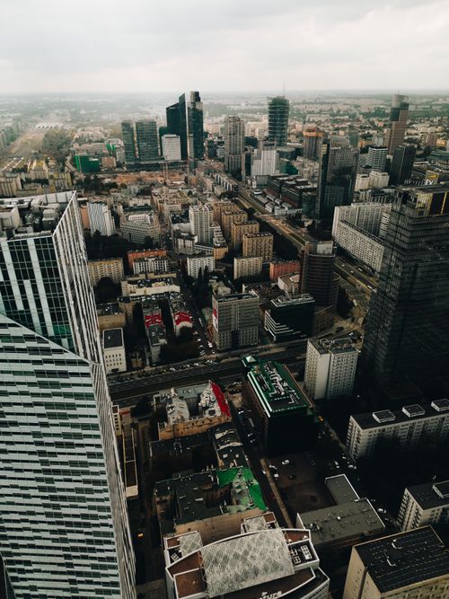 Free Stunning aerial view of Warsaw's modern skyline, showcasing skyscrapers and urban architecture. Stock Photo