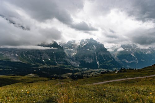 View of Rocky Mountains under a Cloudy Sky 