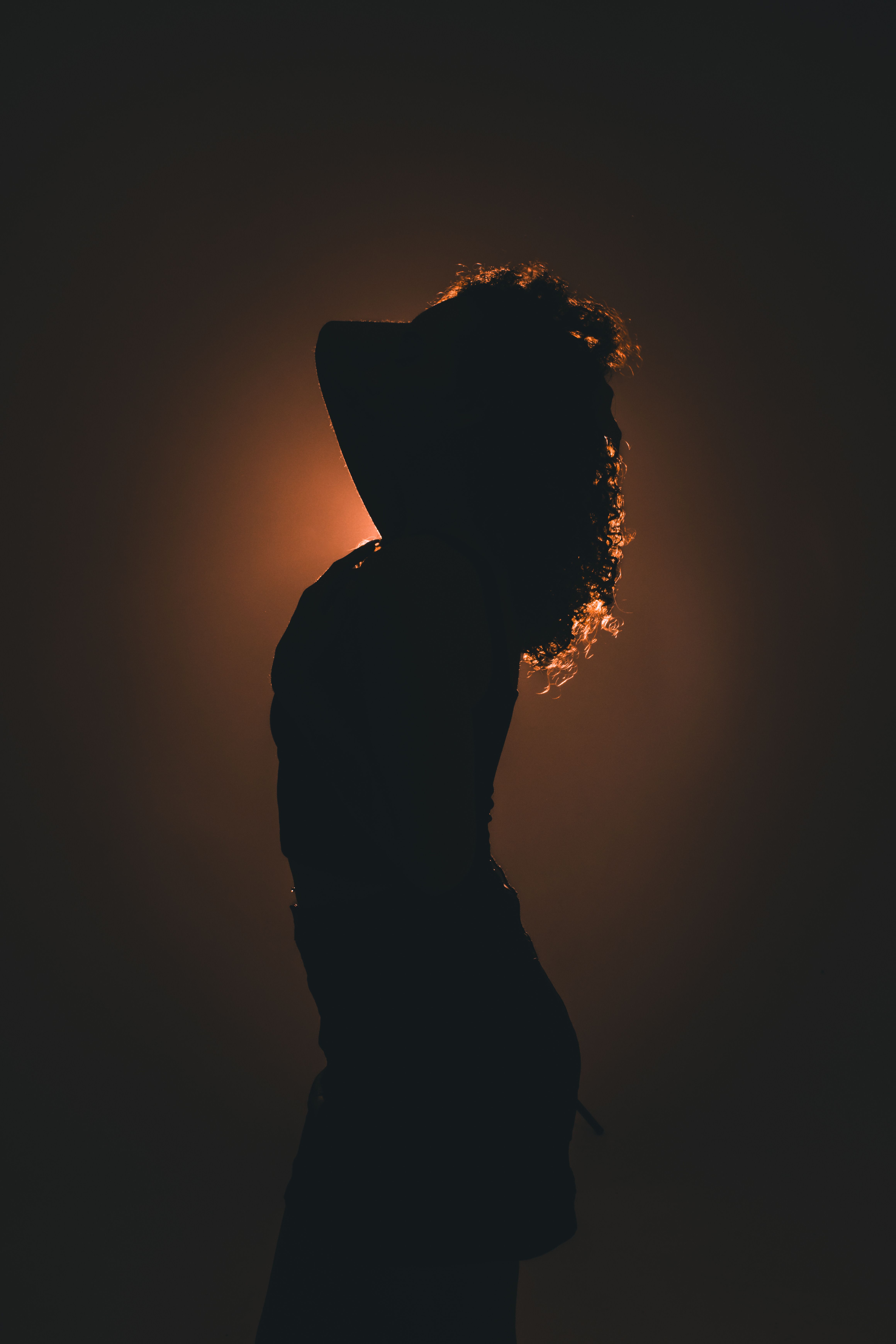 Woman Silhouette in Sunset Darkness · Free Stock Photo