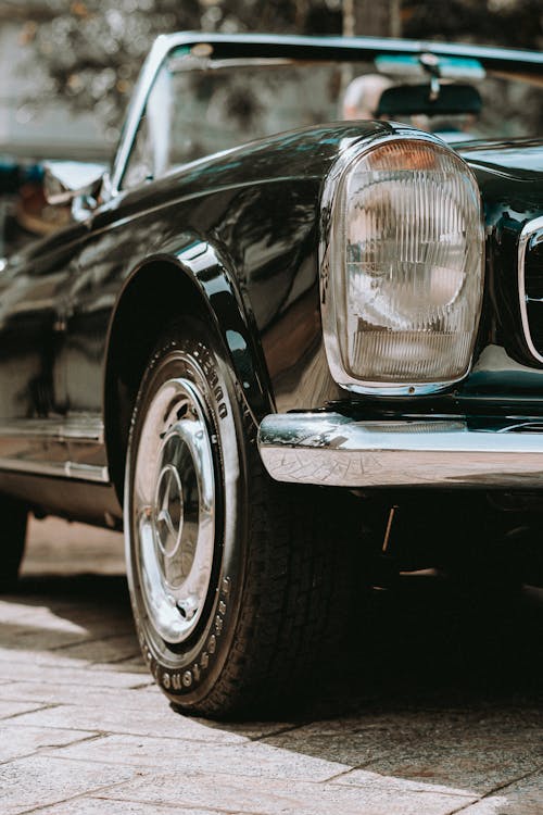 Headlight and Side of a Classic Mercedes Convertible