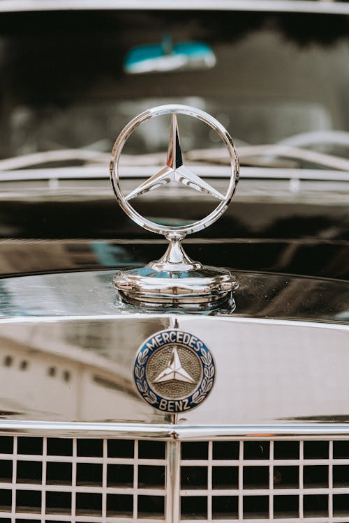 Close-up of the Logo of a Vintage Mercedes Car 