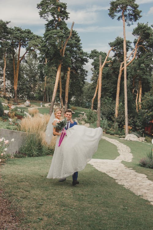 Groom Carrying Bride 