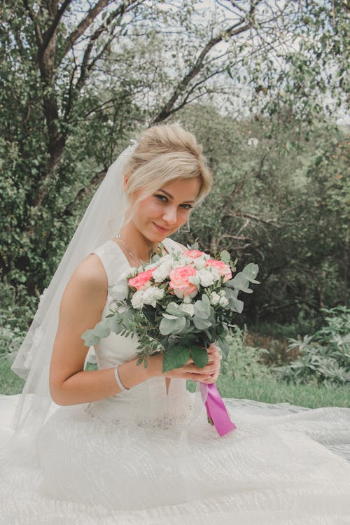 Portrait of Bride with Flowers Bouquet