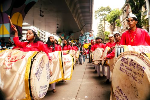 Free A lively street parade with drummers celebrating Ganesh Chaturthi in India. Stock Photo