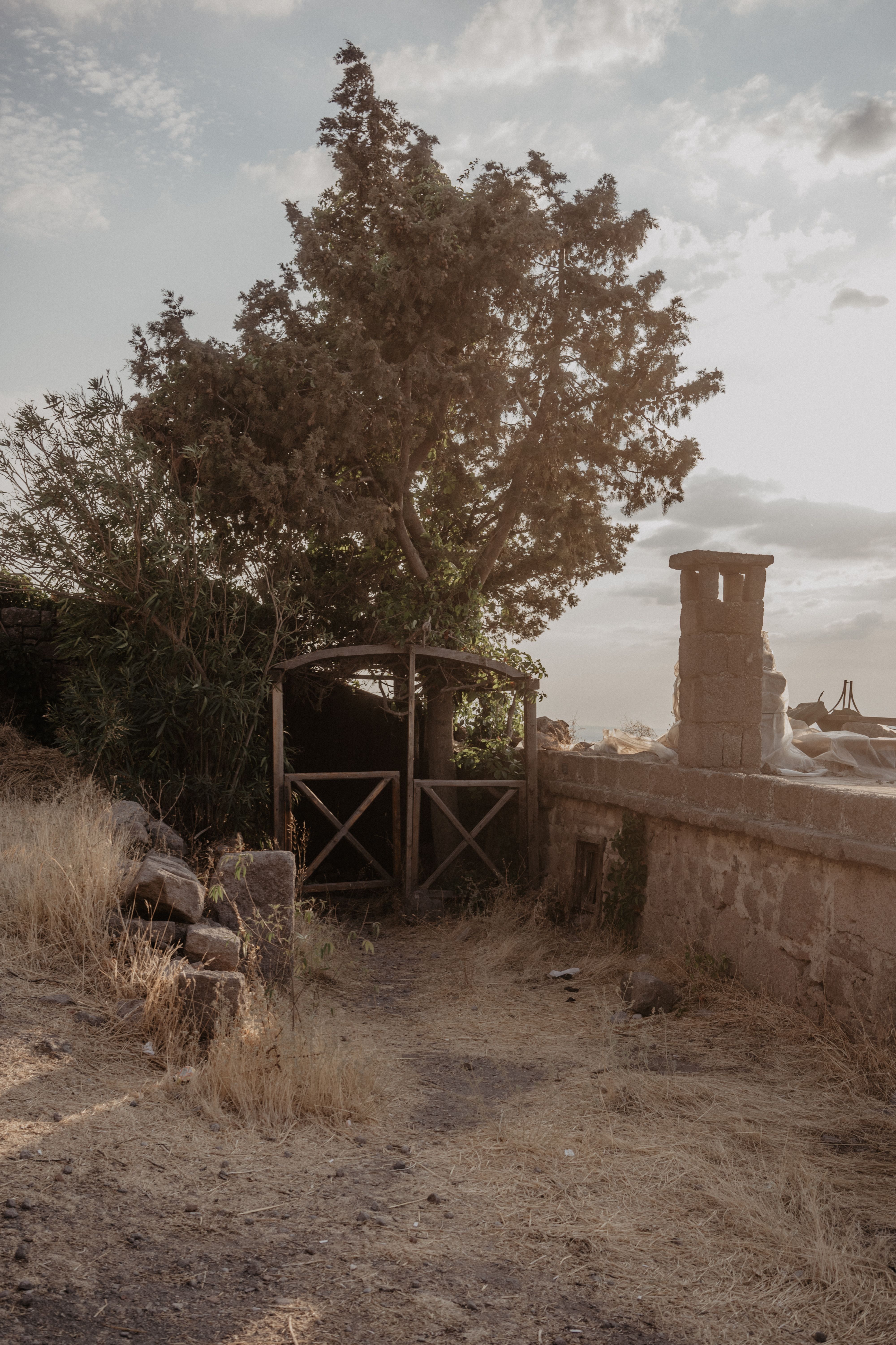 Stone Wall and a Gate in the Ruins of a Building · Free Stock Photo