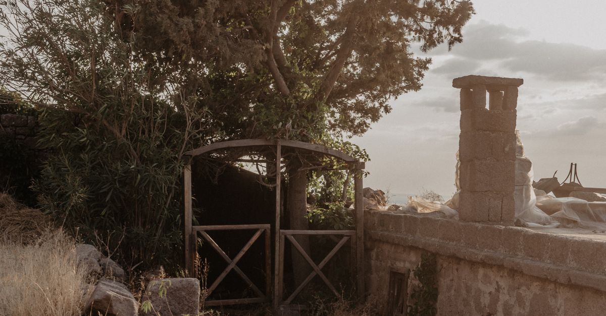 Stone Wall and a Gate in the Ruins of a Building · Free Stock Photo