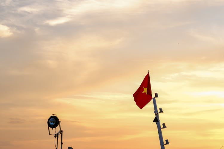 Vietnamese Flag At Sunset