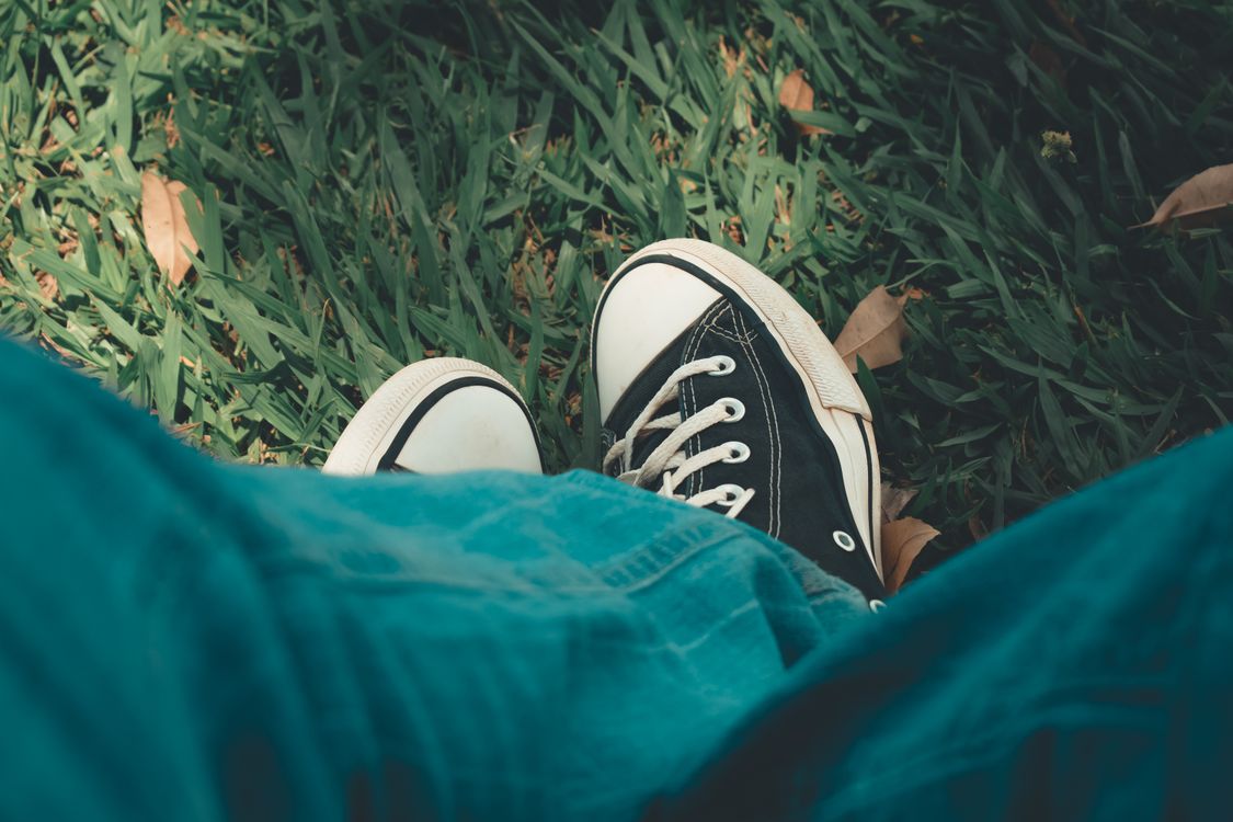 Person Sitting on Grass · Free Stock Photo