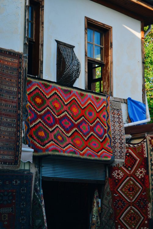 Draped Rug Images Rugs with Colorful Patterns Hanging on the Balcony · Free Stock Photo
