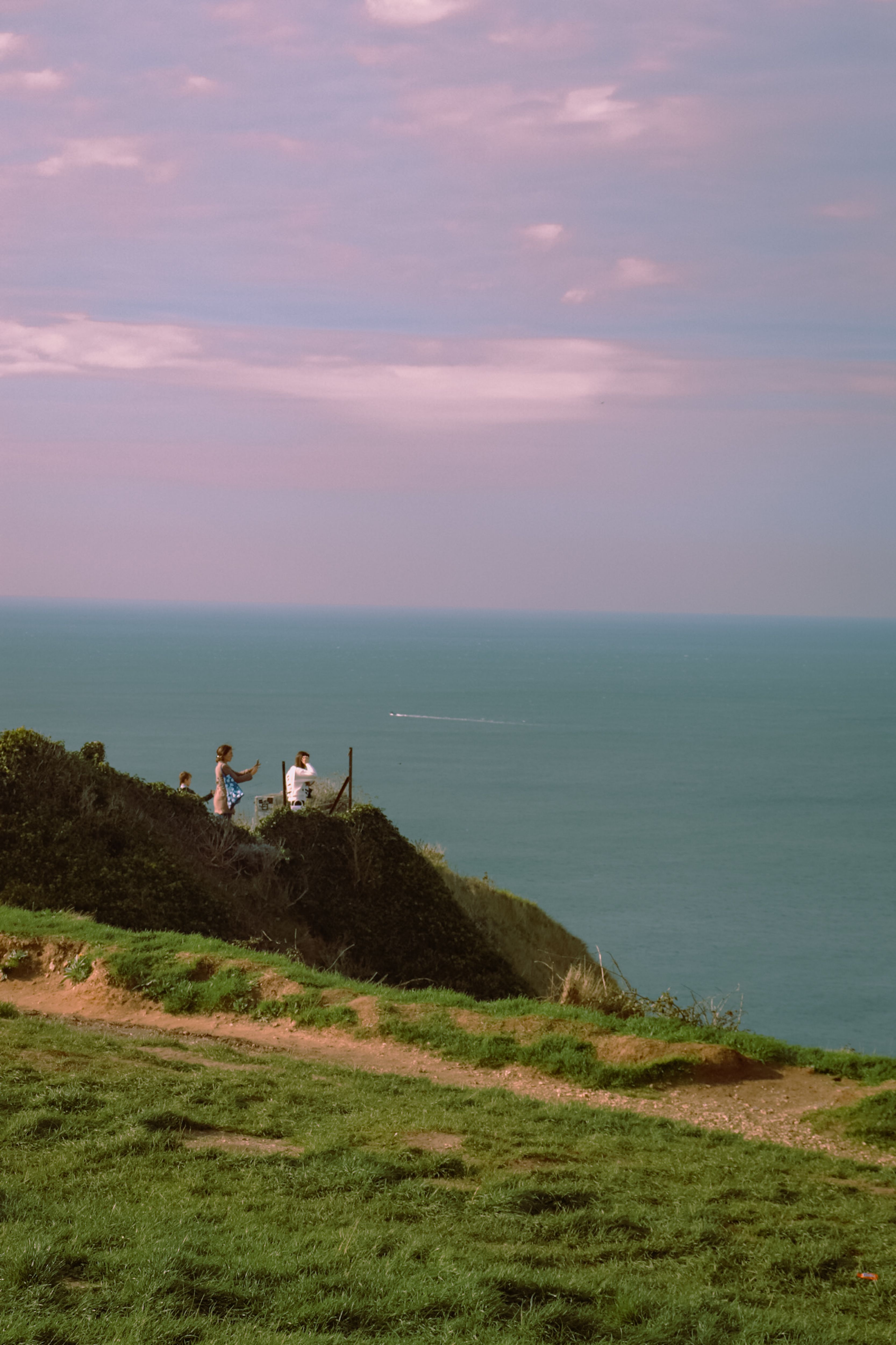 People on the Top of a Hill by the Sea · Free Stock Photo
