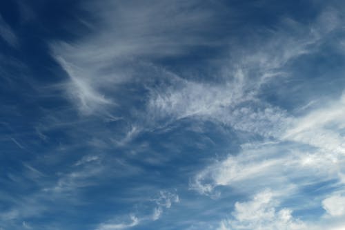 Feathery Cirrus Clouds in Blue Sky