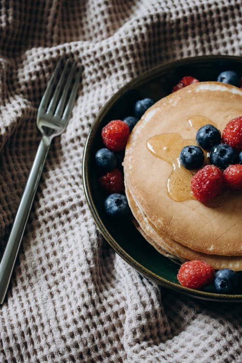 Free Pancakes with Berries and Honey  Stock Photo