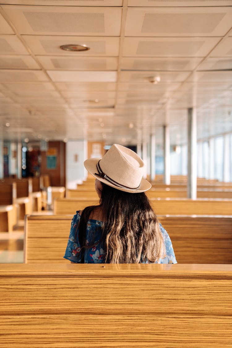 Woman Seating In A Ferry