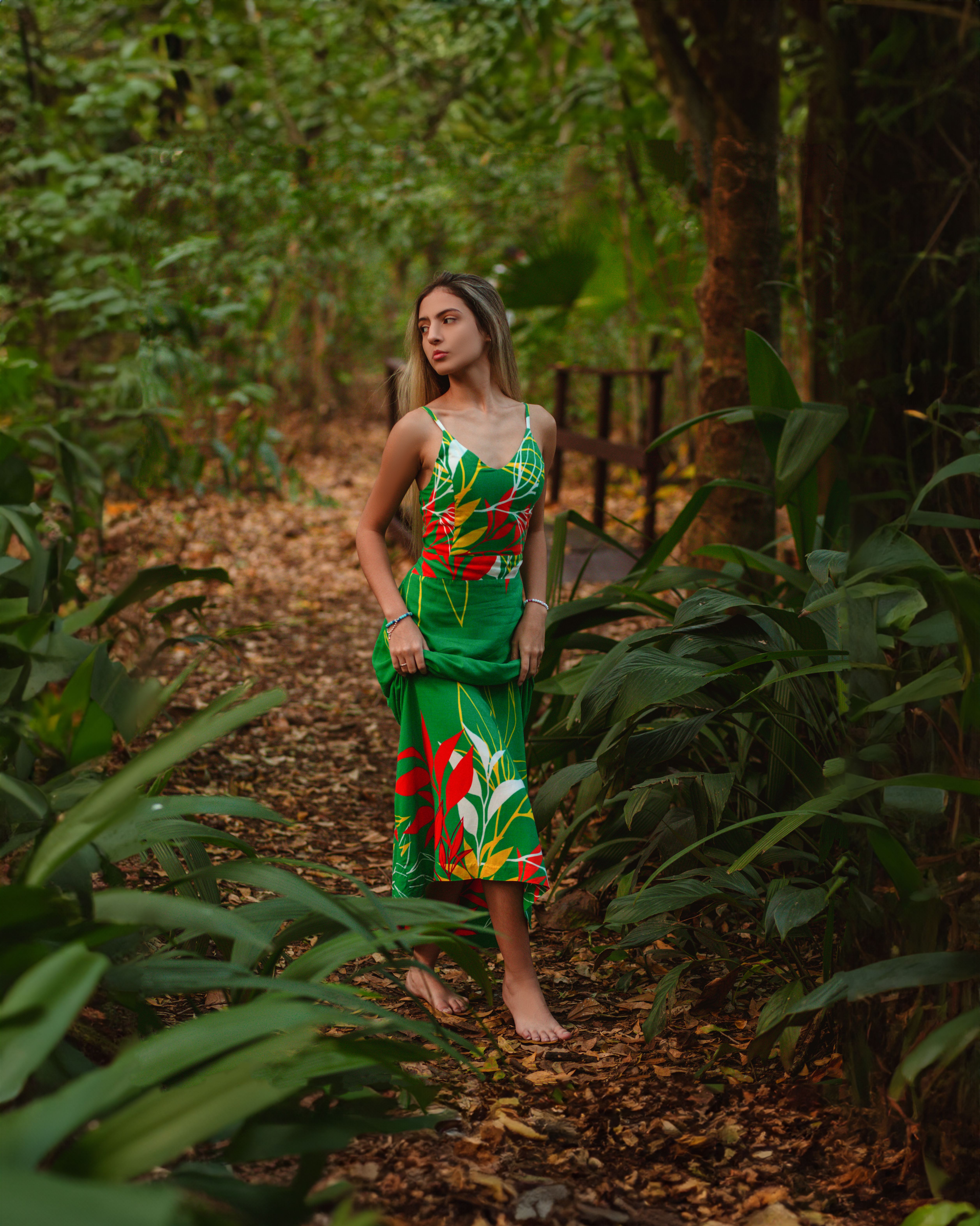 Woman Wearing Green Dress Posing in a Forest · Free Stock Photo