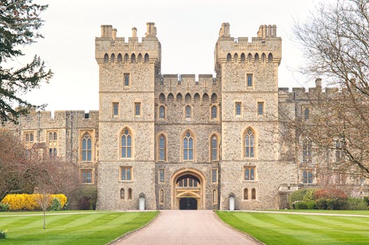 Entrance view of Windsor Castle, a historic landmark in England. by Angel Smith