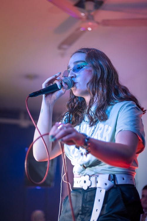 Woman Singing on Karaoke Party