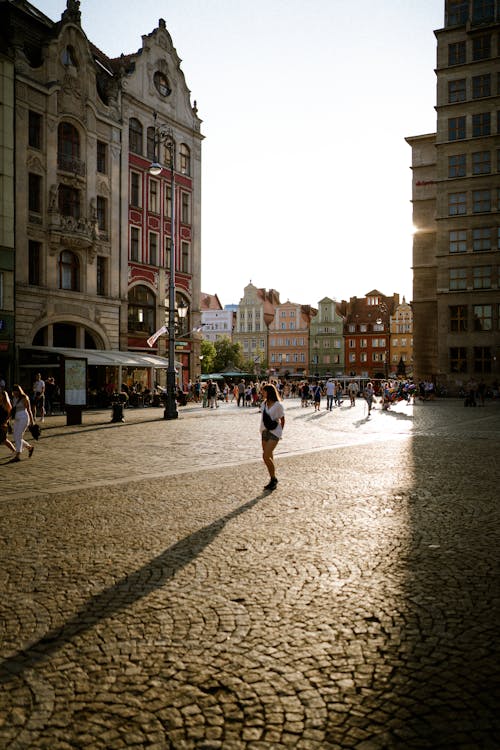 Woman Walking on Old Town in Wroclaw