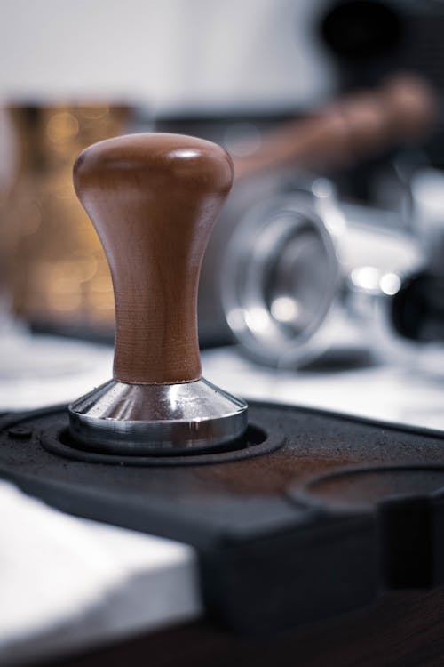 Close up of Wooden Item on Black Surface