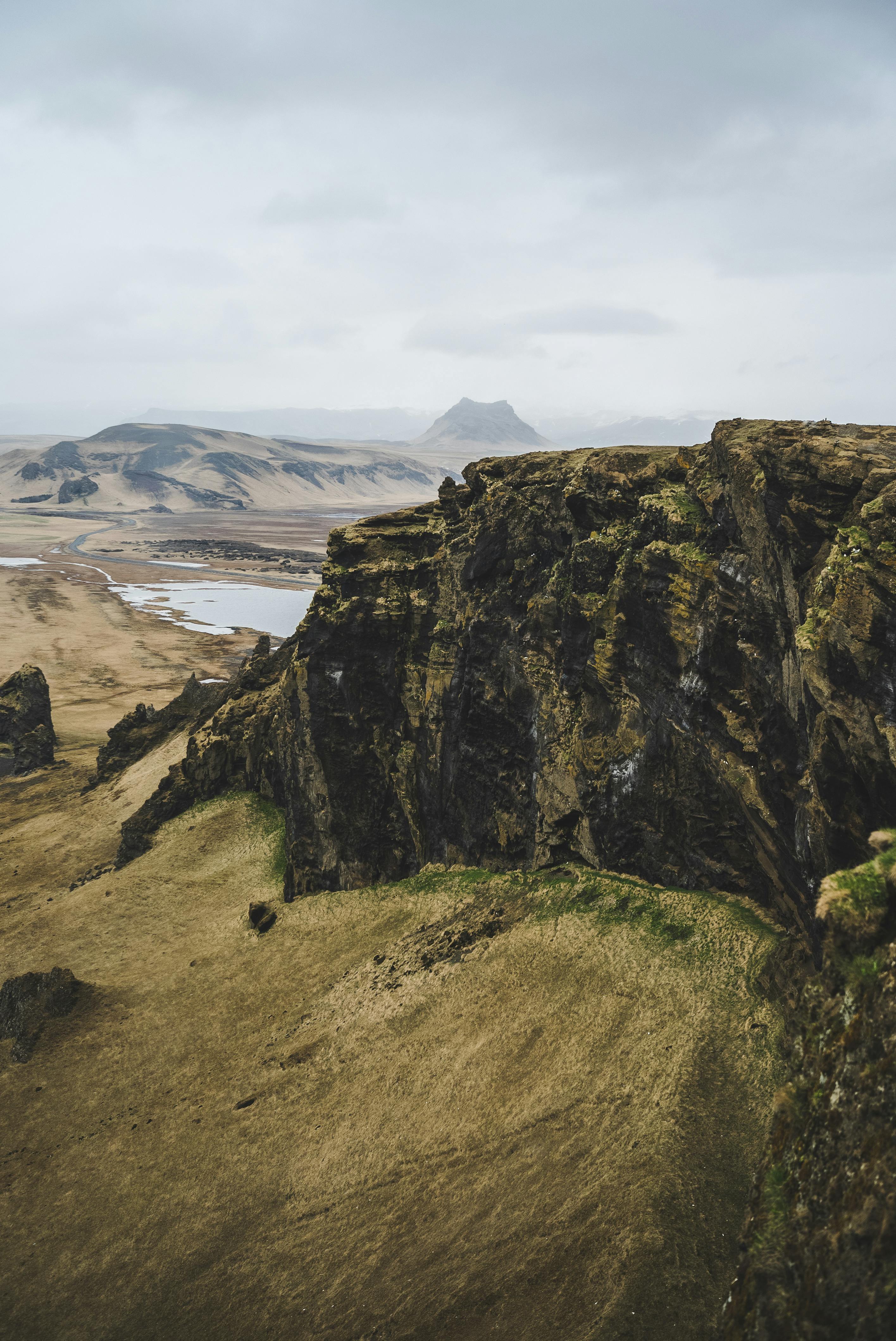 A breathtaking view of eroded cliffs and expansive terrain captures the beauty of nature.