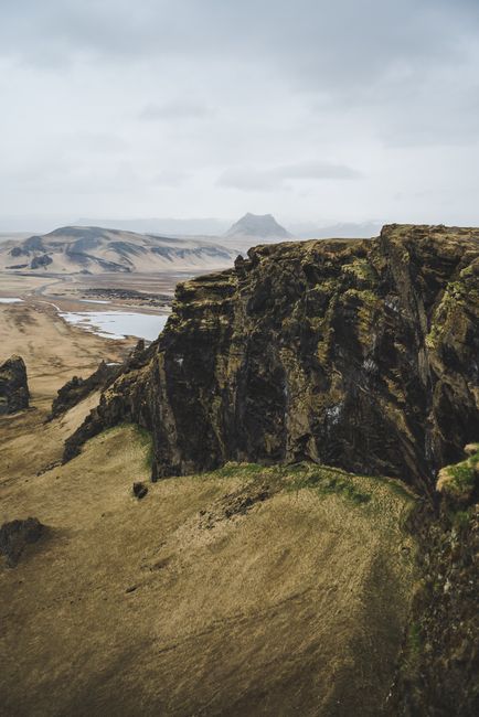 A breathtaking view of eroded cliffs and expansive terrain captures the beauty of nature.