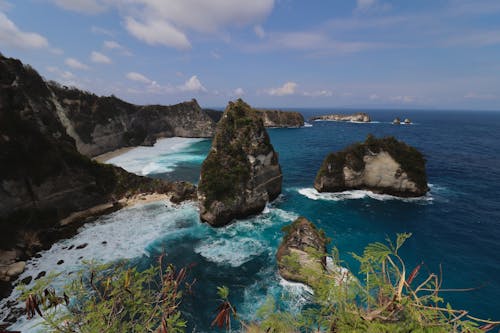 Foto profissional grátis de água, beira-mar, borrifar