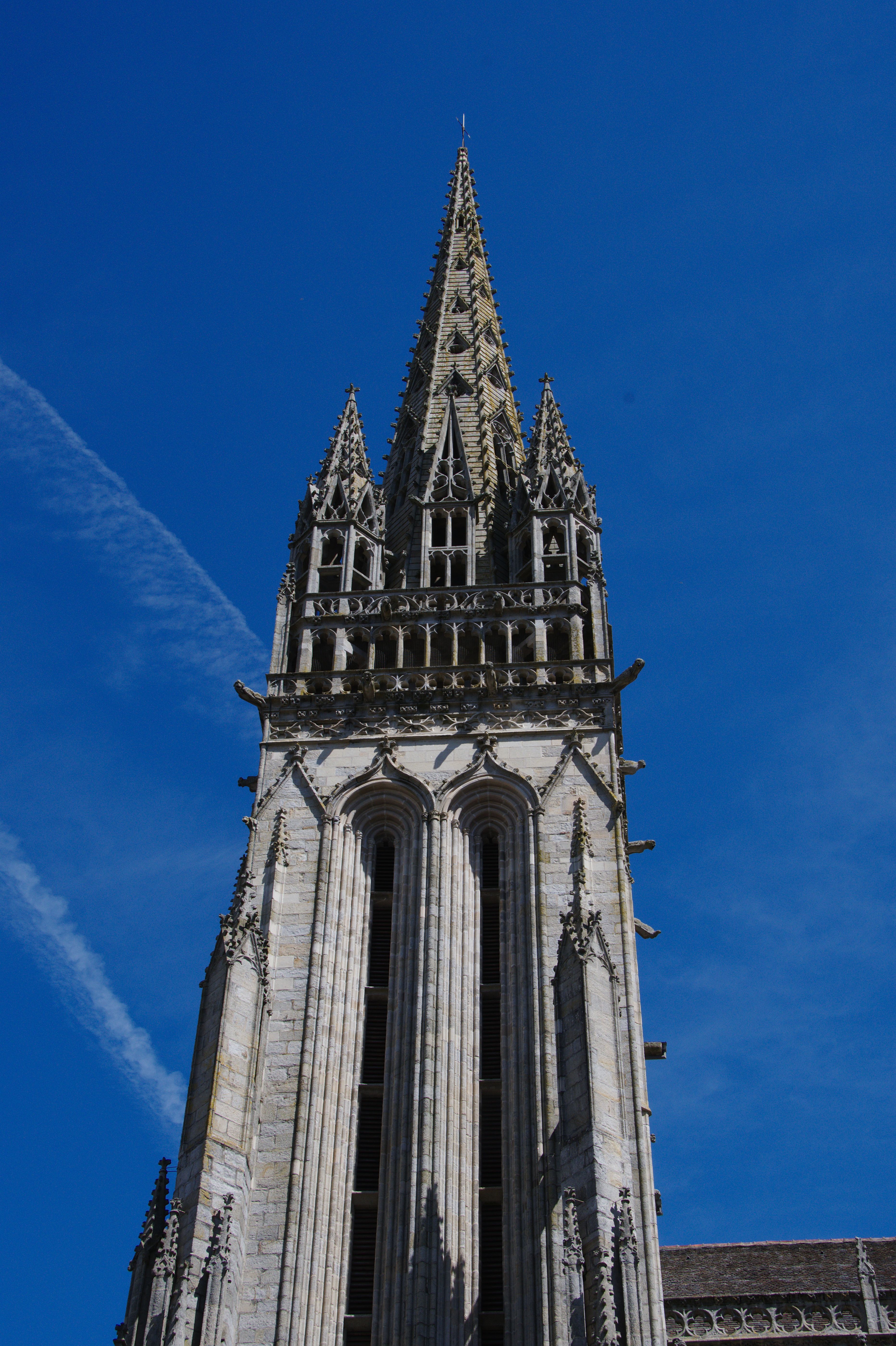 A striking view of the Gothic-style tower of Quimper Cathedral in Bretagne, France.