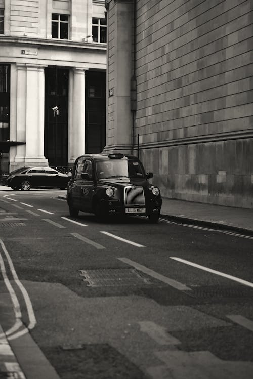 倫敦出租車, 單色, 垂直拍攝 的 免費圖庫相片