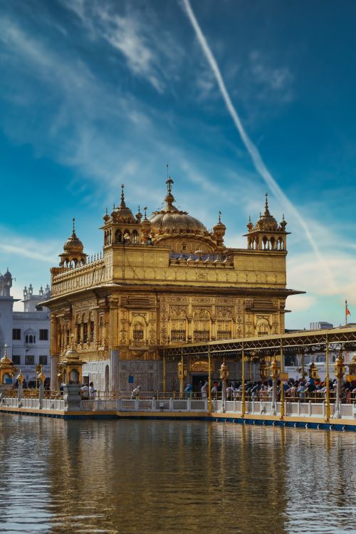 Free Stunning view of the Golden Temple in Amritsar, India with reflections in the water. Stock Photo