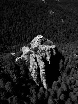 Breathtaking aerial black and white shot of Mirador Peña del Cuervo, featuring stunning rock formations.