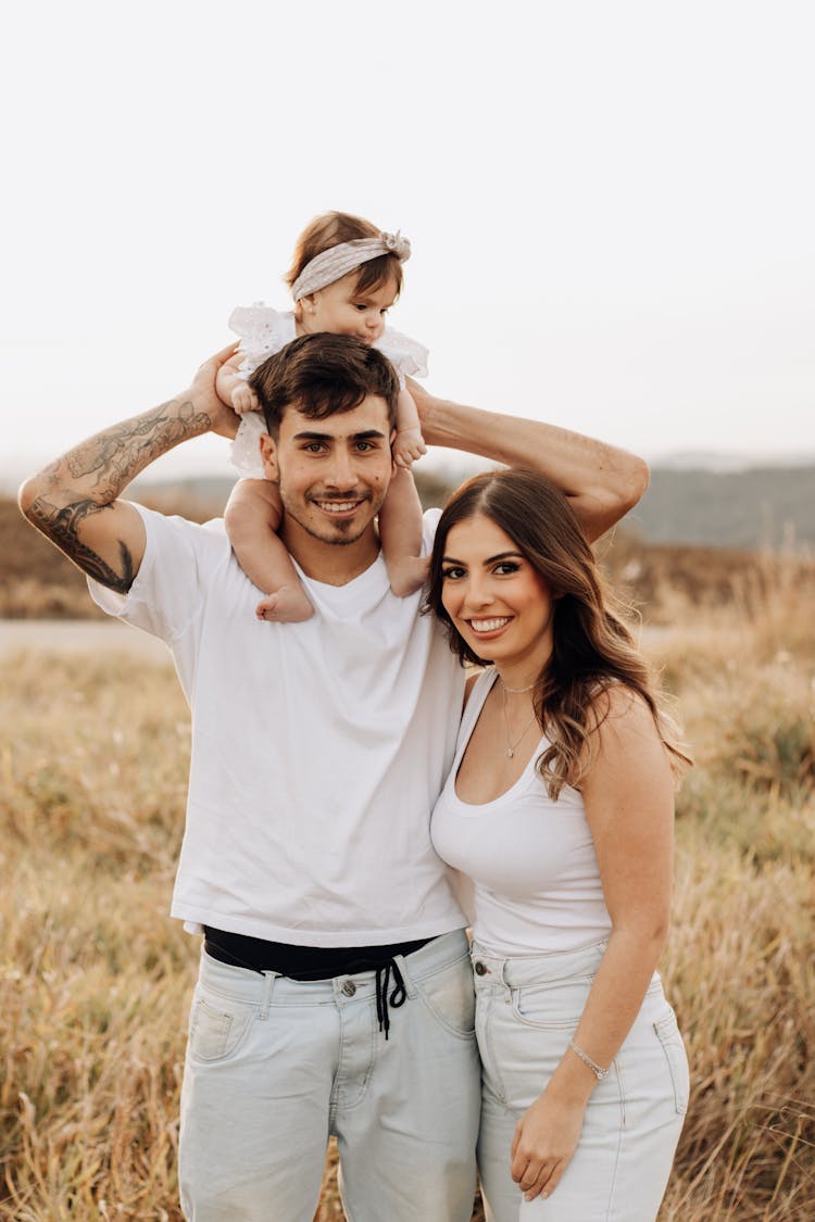 Portrait Of Mother And Father With Baby