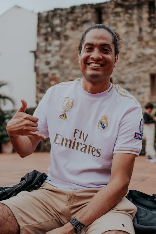 Portrait of a Friendly Man Making a Shaka Sign