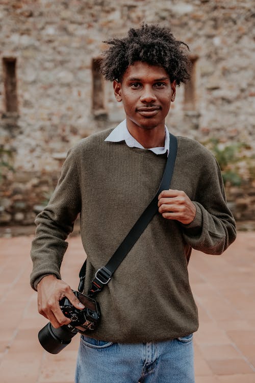 Portrait of a Photographer with an Afro Hairstyle