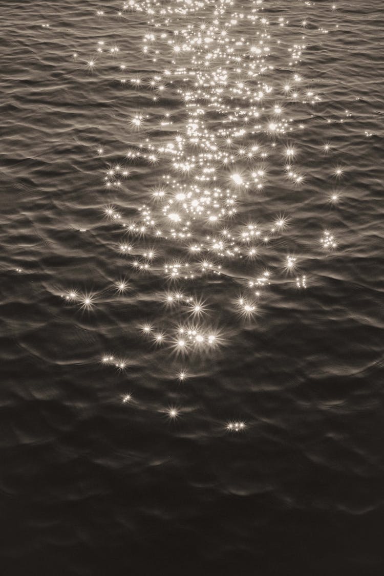 Sun Flares On Sea Surface