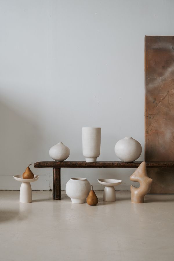 Ceramic vases in a minimalist space by Mathilde Langevin on Pexels