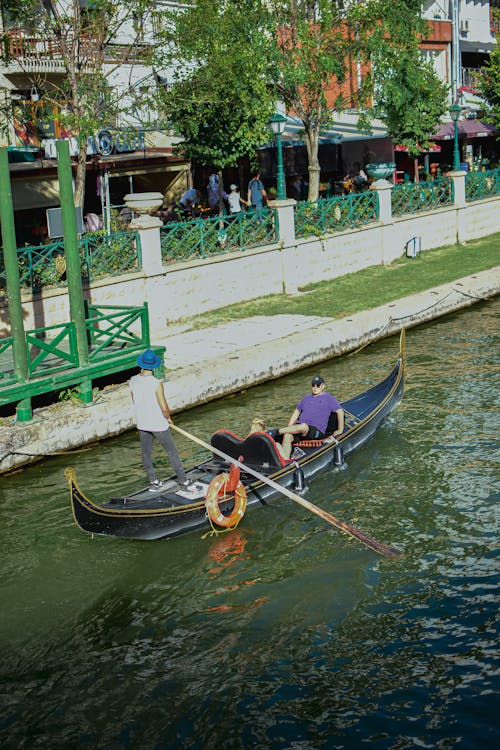 Men in Gondola on Canal