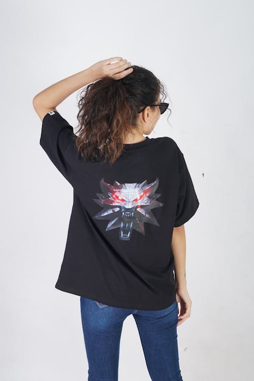 Back View of Woman in Witcher T-shirt