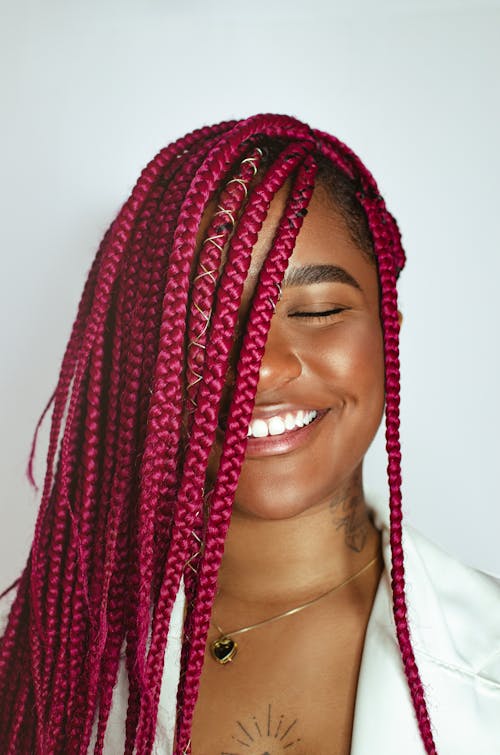 Smiling Woman with Dyed Dreadlocks