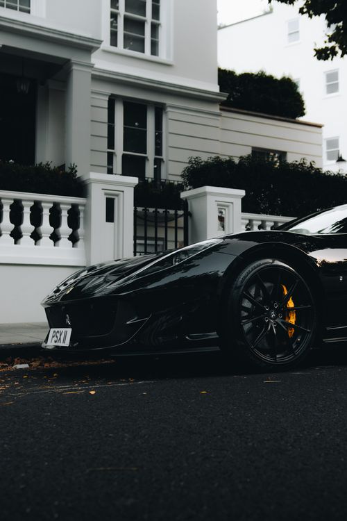 Free Stylish black sports car parked in elegant London neighborhood street. Stock Photo
