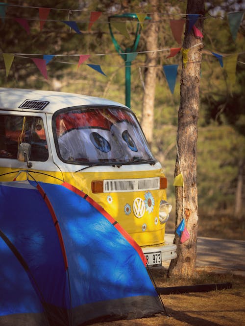 Yellow Camper Van in a Forest 