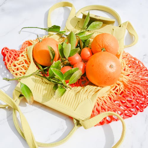 Oranges and Tangerines on a Shopping Net