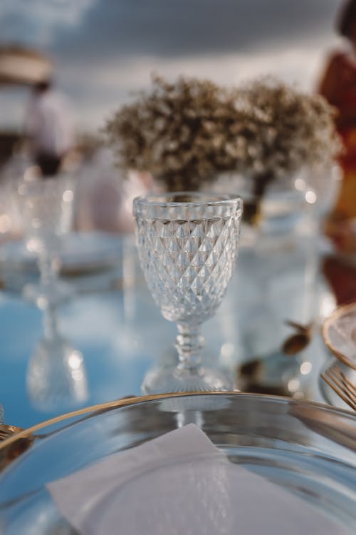 Close-up of a Glass and Plate on the Banquet Table 