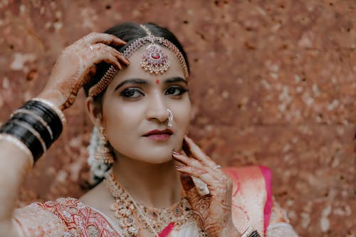 Portrait of Woman with Traditional, Golden Jewelry