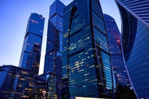 Free Dramatic view of Moscow's skyscrapers in evening light, showcasing modern architecture. Stock Photo