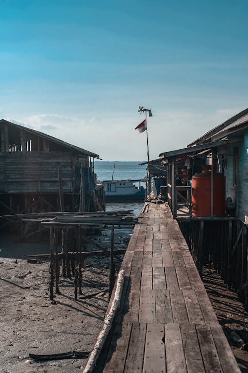 Wooden Footbridge over Sand Beach 