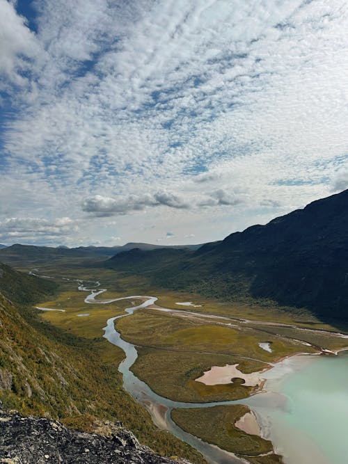 Twisted River Crossing Valley and Ending in Lake