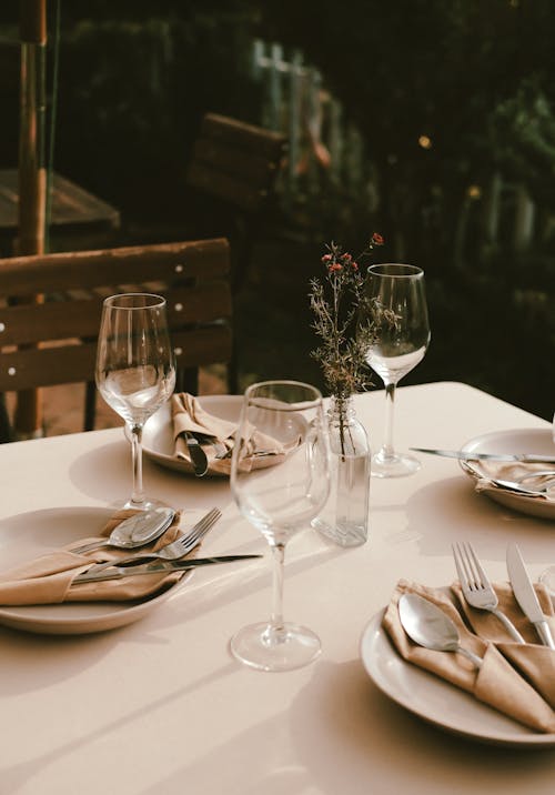 Free Table Set for Dinner in a Restaurant Stock Photo