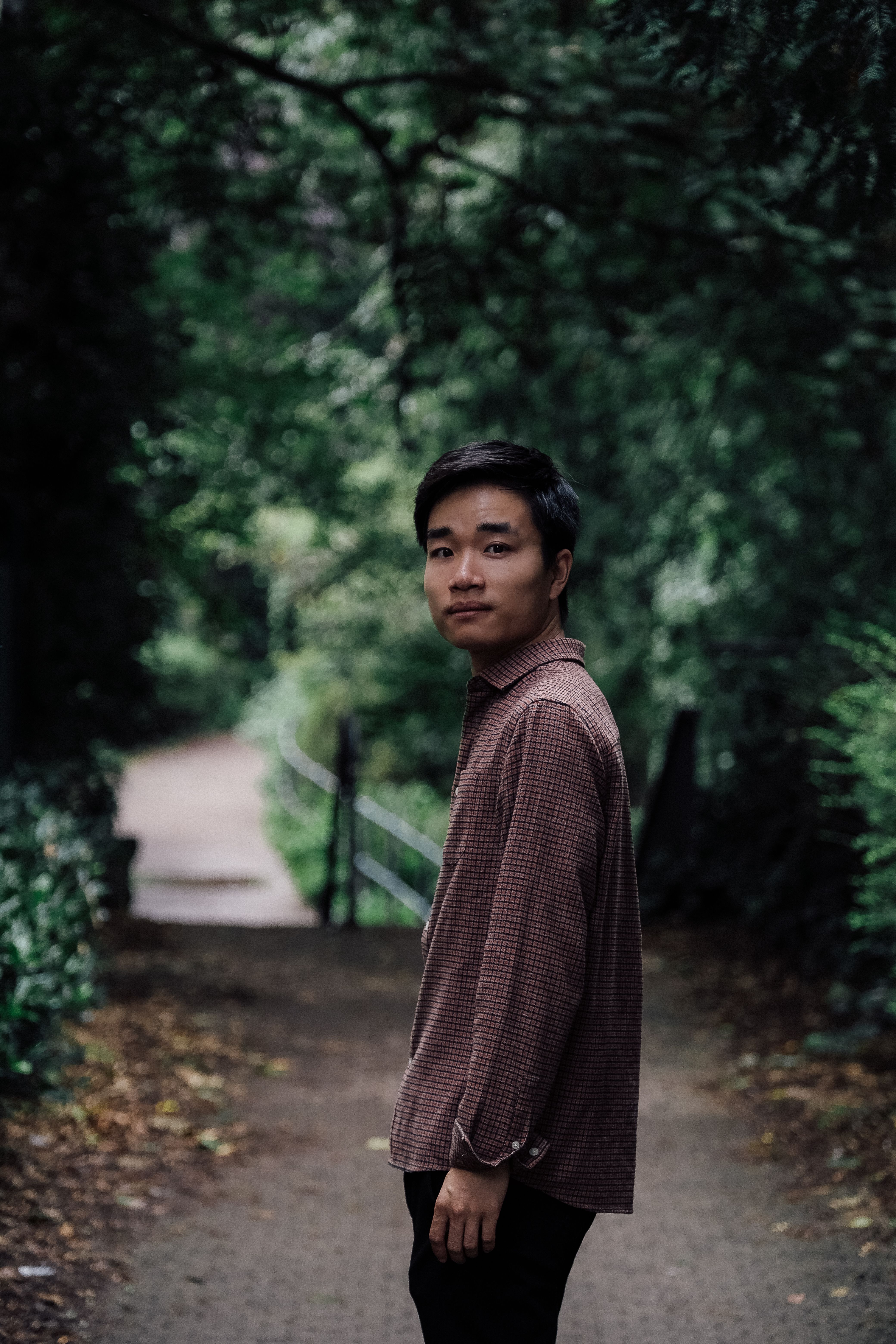 Man in Shirt Standing among Trees · Free Stock Photo