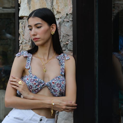 Young Fashionable Woman Wearing Gold Jewelry 