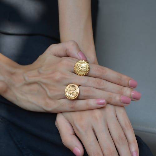 Woman Wearing Golden Rings