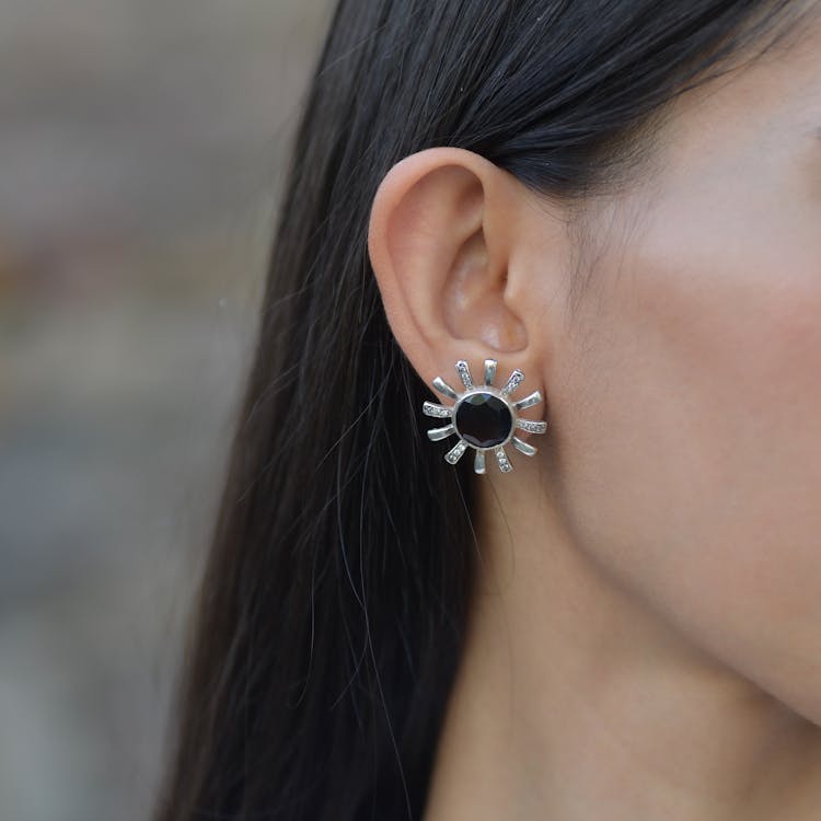 Brunette Woman Wearing Earrings